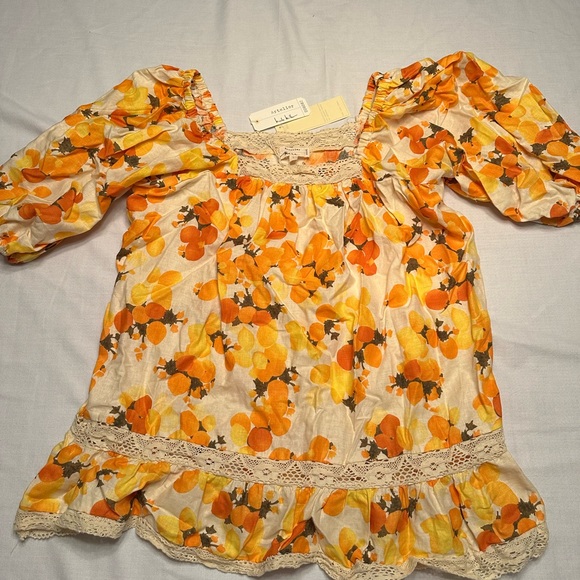 Nicole Miller. Bright Yellow and Orange top with balloon sleeves and lace trim. - Picture 1 of 4